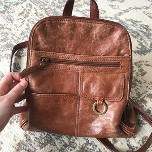 Vintage leather backpack purse.